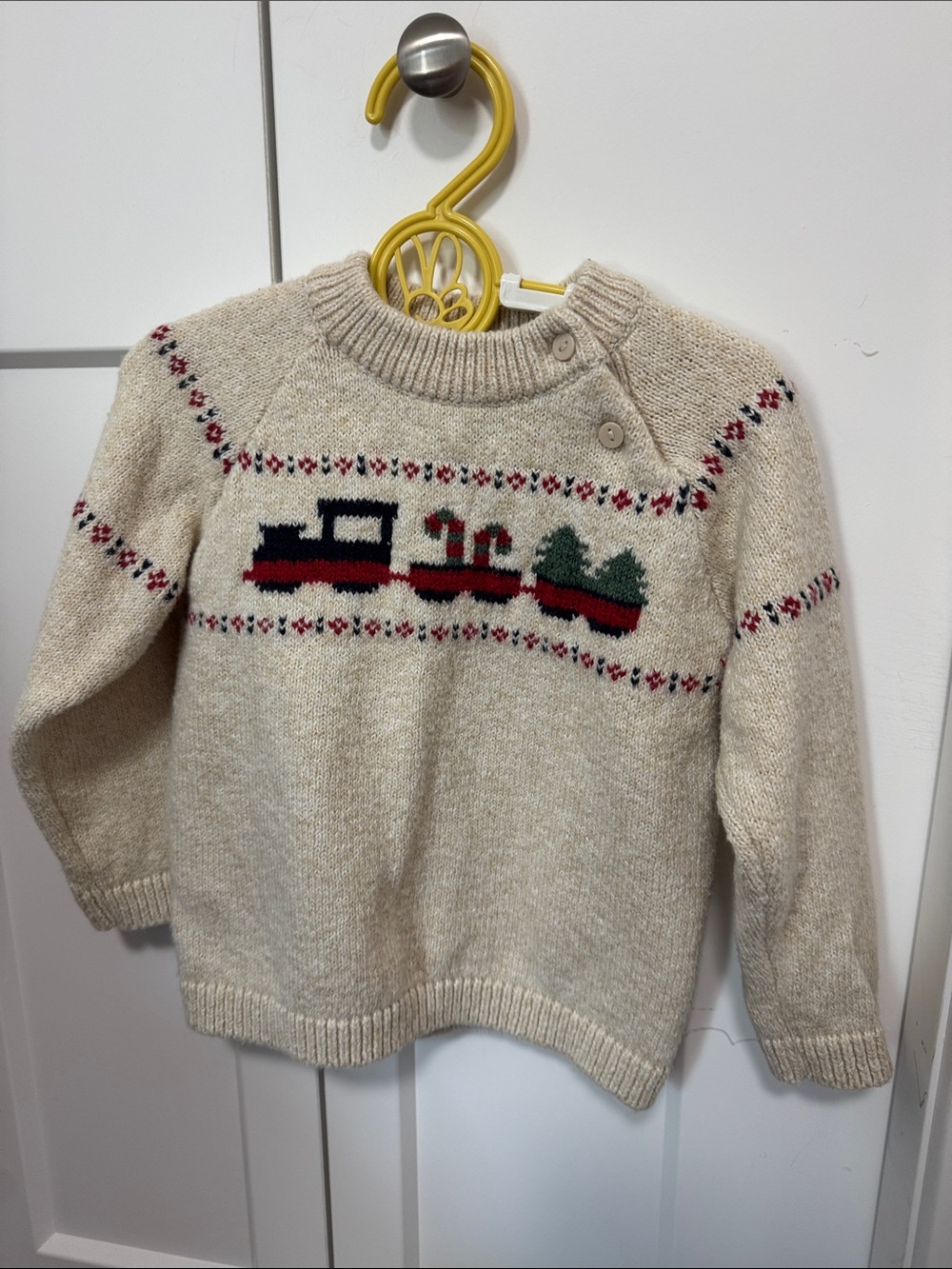 H&M Cream Knit Sweater with Red, Black and Green Train Motif